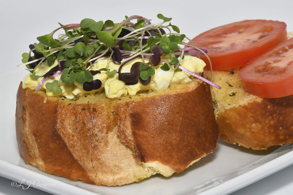 Sprouts on a sandwich photo for a restaurant menu by LJ Creapeau, Master Photographer